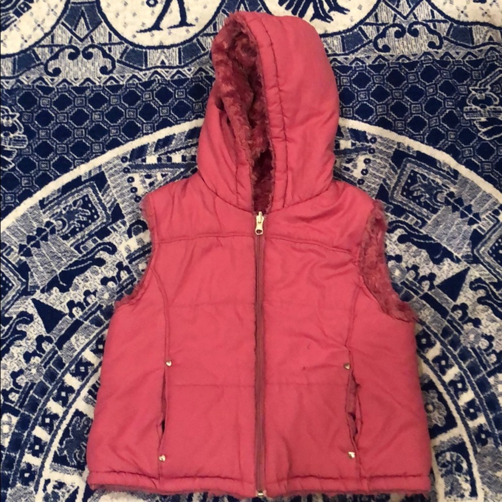 Double sided vest with hoodie for girls.